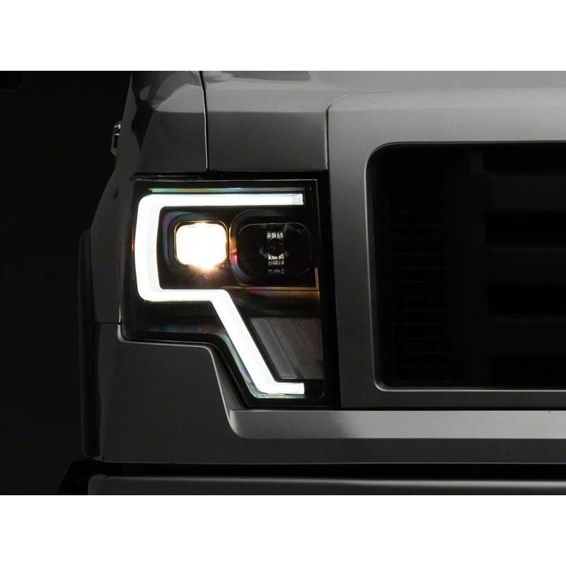 Raxiom 09-14 Ford F-150 G4 Projector Headlights- Black Housing (Clear Lens)